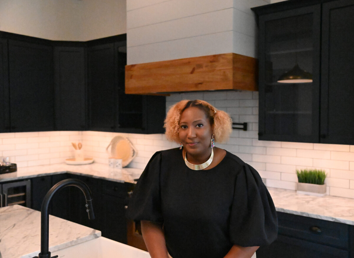 Woman standing in kitchen